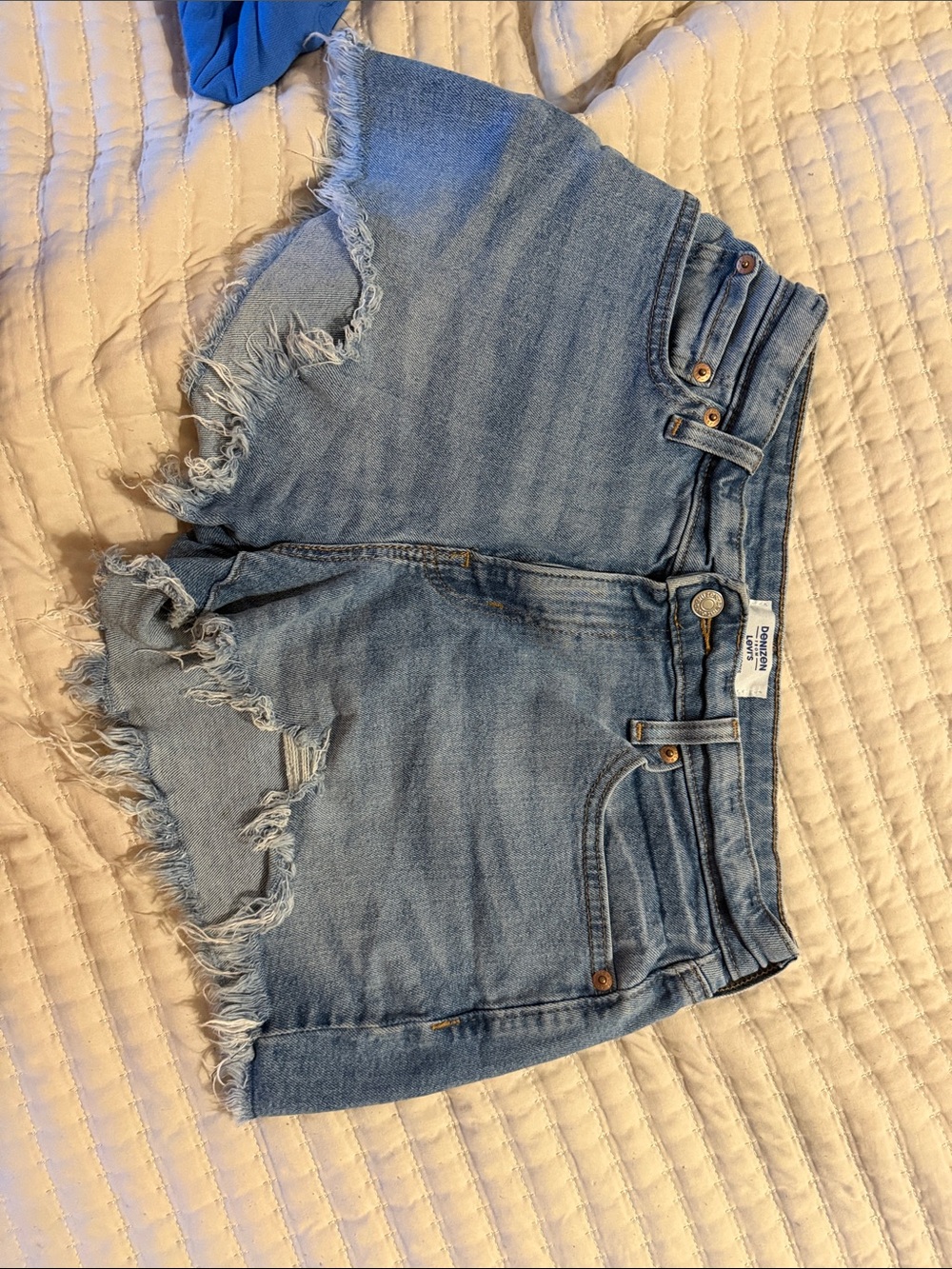 High-Rise Light Blue Frayed Denim Shorts